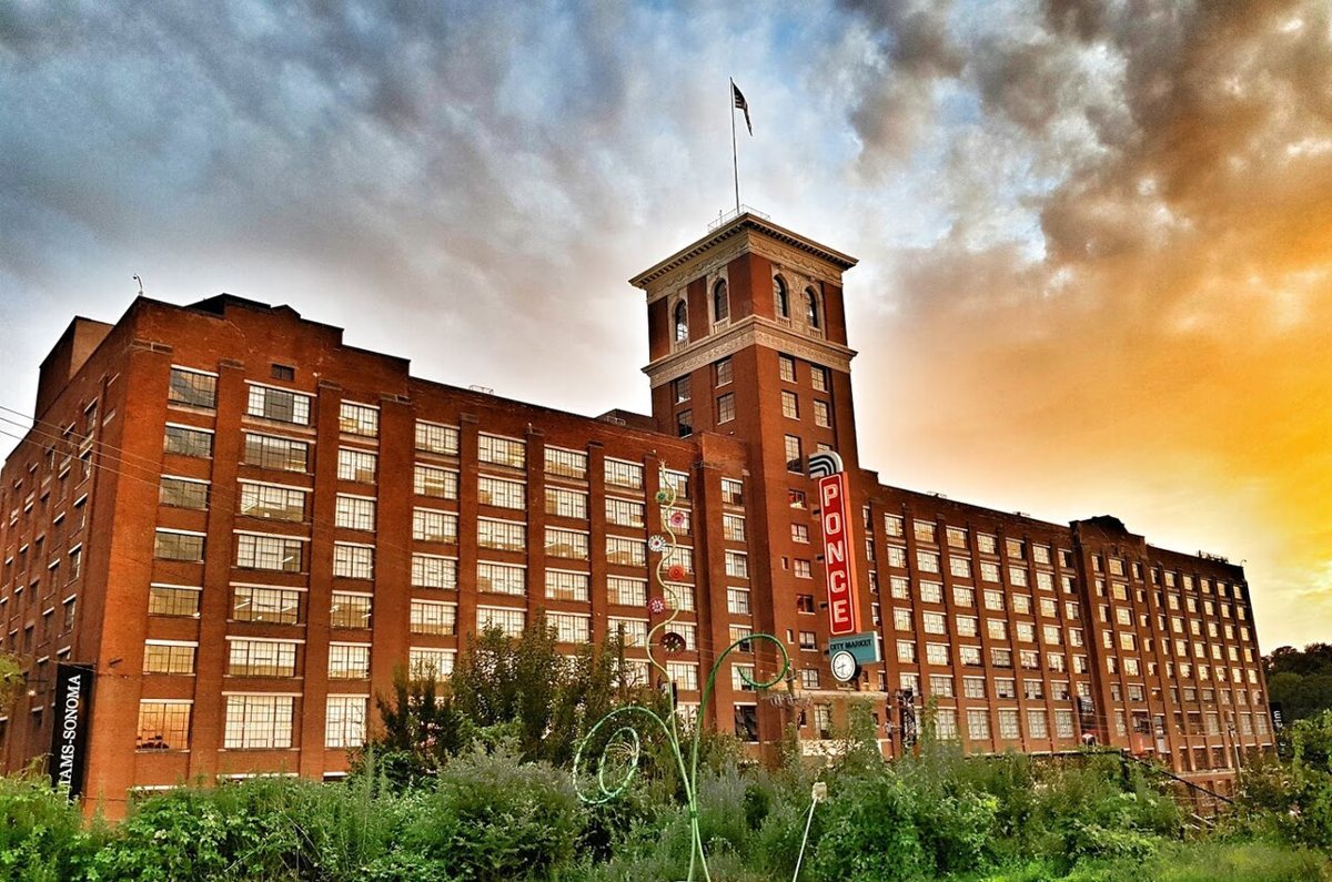 Ponce City Market rooftop with Atlanta skyline view at dusk