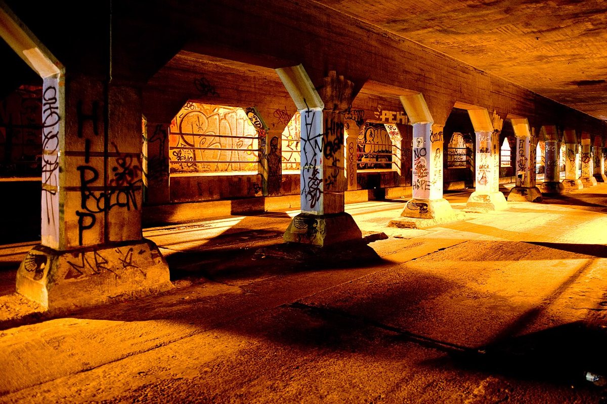 spray-painted murals covering the walls and ceiling of the Krog Street Tunnel in Inman Park Atlanta